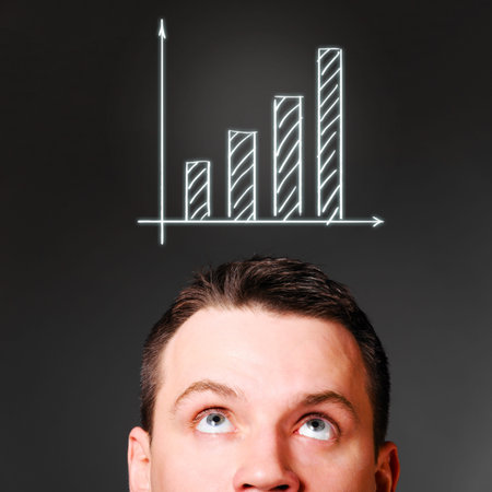 male head with rising bar chart, business conceptの写真素材