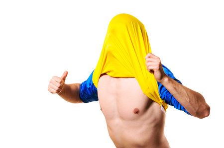 happy football or soccer player with jersey on his head isolated on white background