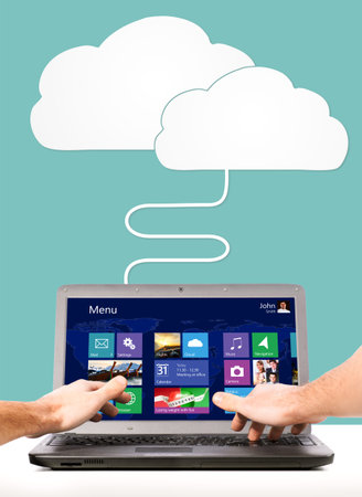 male hands are working on laptop connected to clouds