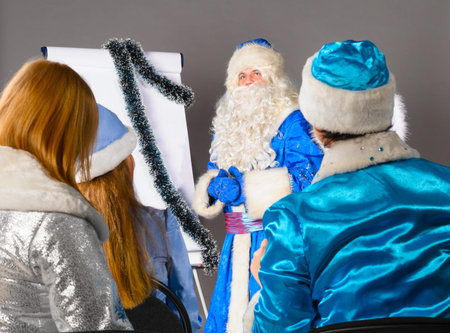 santa claus is conducting a business trainingの写真素材