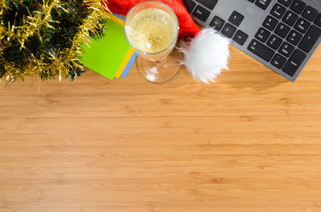 office desk with christmas accessories and stationery, view from aboveの写真素材
