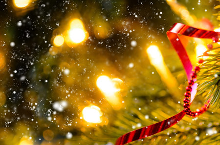Christmas or New Year fir tree with decorative lights and toys