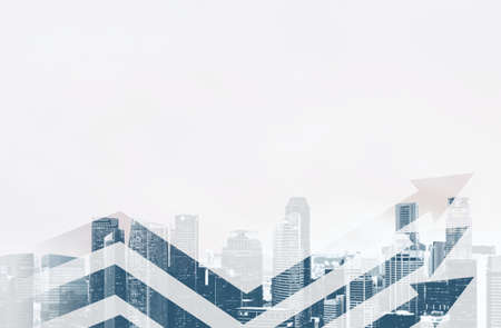 Business growth chart. Arrows against blurred panoramic view of Singapore downtown and skyline at sunset in office window.の写真素材