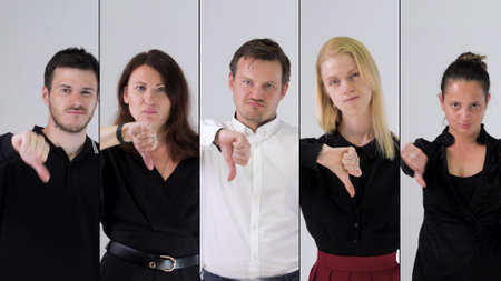 Business team disapproving and showing thumbs down.の写真素材