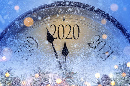 Countdown to midnight. Retro style clock counting last moments before Christmass or New Year 2020.