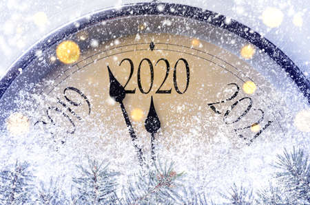 Countdown to midnight. Retro style clock counting last moments before Christmass or New Year 2020.の写真素材