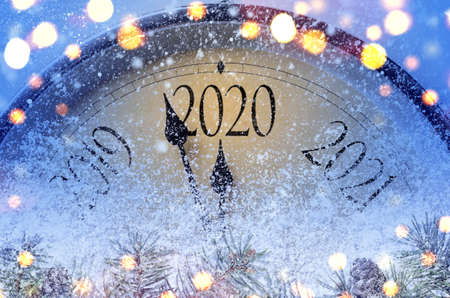 Countdown to midnight. Retro style clock counting last moments before Christmass or New Year 2020.の写真素材