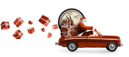Christmas is coming. Santa Claus on toy car delivering New Year 2021 gifts and countdown clock isolated on white backgroundの写真素材