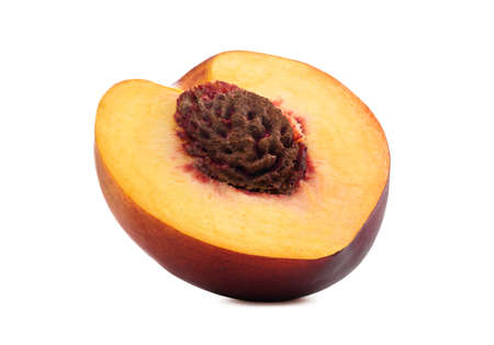 Fresh peach isolated. Organic nectarine or peach slice on white background.の写真素材