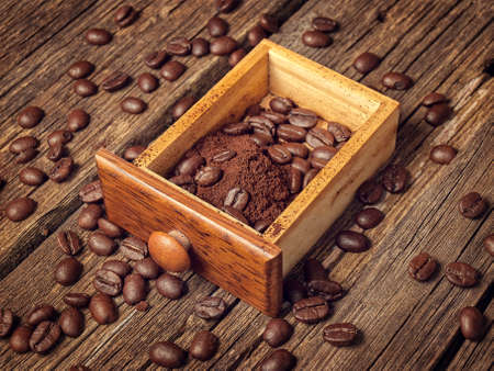 Coffee ground and in beans in a boxの写真素材