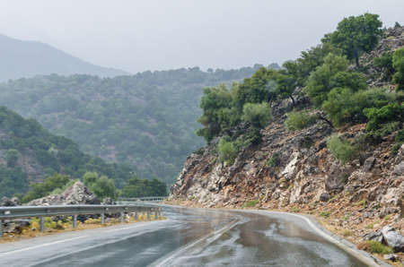Mountain wet roadの写真素材
