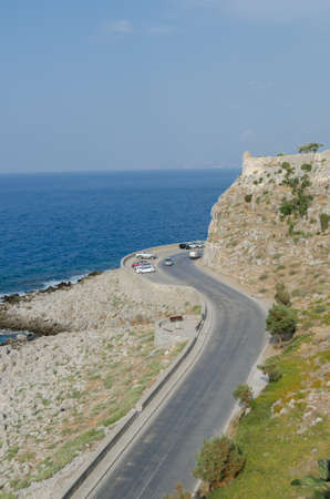 Mountain road by the seaの写真素材