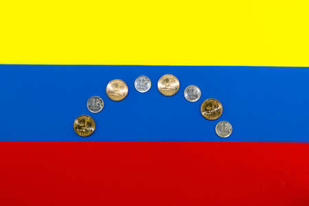 Crisis in venezuela stylized flag of venezuela. Russian rubles and US dollars lie on the flag of Venezuelaの写真素材