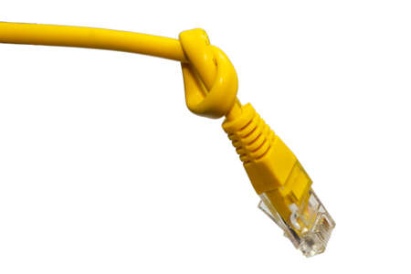 bans and restrictions on the Internet. internet cable tied in knot isolated on white backgroundの写真素材