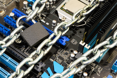 censorship, restrictions and restrictions on the Internet. concept, motherboard in chains under lock...