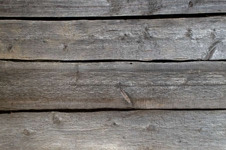 old weathered wooden shield of planks, backgroundの写真素材