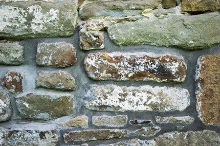 texture of masonry, the fragment of a stone wall of an ancient temple of the 10th century,...