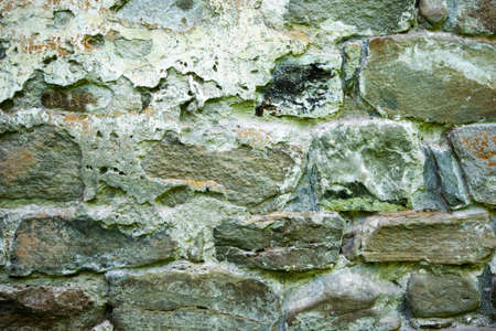 texture of masonry, the fragment of a stone wall of an ancient temple of the 10th century, background, backdropの写真素材
