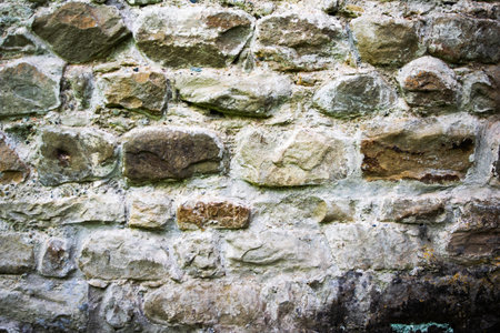 texture of masonry, the fragment of a stone wall of an ancient temple of the 10th century,...