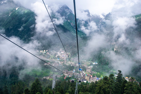cable car on a mountain slope cable cars running up and down