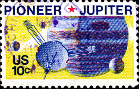 02.09.2020 Divnoe Stavropol Territory Russia Postage Stamp United States 1975 Space Pioneer 10 Passing Jupiter spacecraft against the backdrop of the planetのeditorial素材