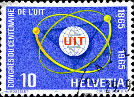 02 10 2020 Divnoe Stavropol Territory Russia postage stamp Switzerland 1965 I.T.U. Congress 1965 - The 100th Anniversary of the International Telecommunication Union Symbole UIT Symbolic depiction of telecommunicationのeditorial素材