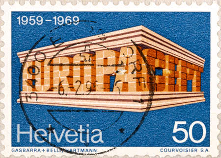02 10 2020 Divnoe Stavropol Krai Russia the postage stamp Switzerland 1969 EUROPA Stamps C.E.P.T. letters forming a templeのeditorial素材
