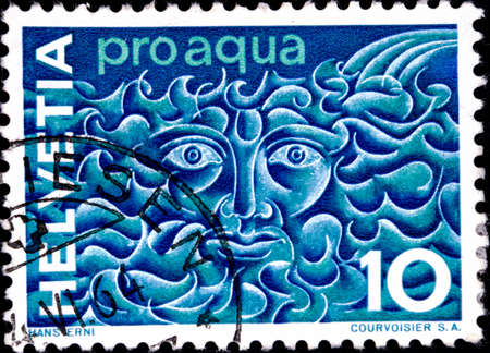 02 08 2020 Divnoe Stavropol Territory Russia the postage stamp Switzerland 1964 Events Pro Aqua Water Pollution Control Head of an ancient water god in bubbling waterのeditorial素材