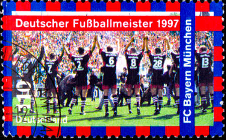 02 08 2020 Divnoe Stavropol Territory Russia postage stamp Germany 1997 Bayern Munich - German Football Champion football players holding hands greet fansのeditorial素材