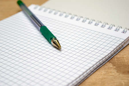 a fountain pen is lying on the open notebook. High quality photoの写真素材