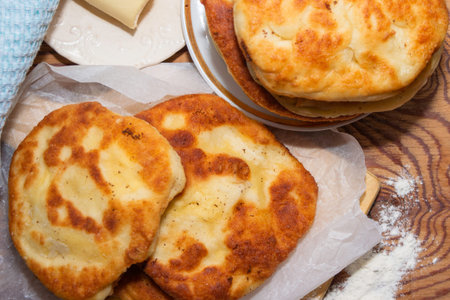 homemade cheese pies are on the kitchen table. High quality photo