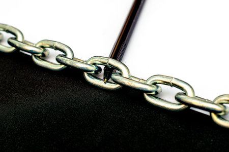 an iron chain divides the plane in half into black and white parts on the white part lies a fountain...