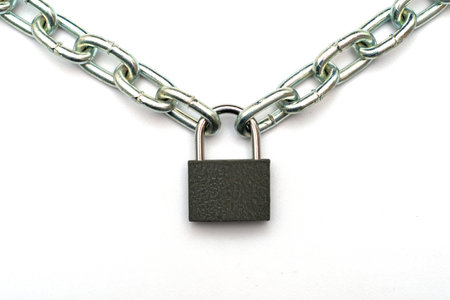 padlock hanging on a chain on a white background. High quality photo