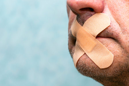 the concept of universal vaccination and freedom of speech is sealed with a medical copyspace patch....