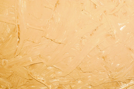 rough plastered textured wall beige background backdrop. High quality photo