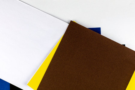 multicolor abstract background made of colored paper sheets. High quality photo