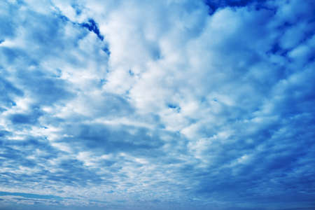 blue cloudy sky on a sunny day background screensaver backdrop. high quality photoの写真素材