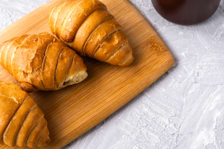mug of coffee and croissants on the table. high quality photoの写真素材