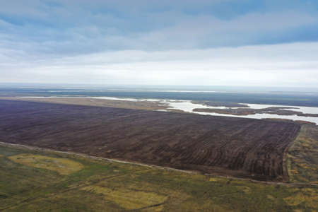steppe plain landscape lake in the middle of fields. high quality photoの写真素材