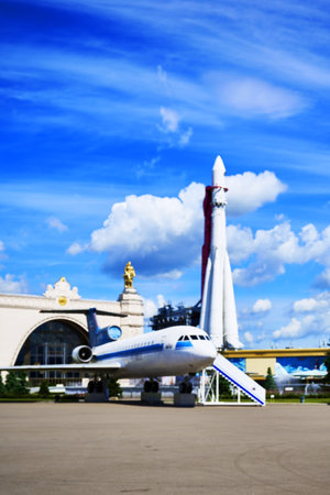 17/06/2022 Russia Moscow VDNH the Yak-42 aircraft and the Vostok launch vehicle against the background of the cosmos pavilion and the blue sky with clouds. high quality photoのeditorial素材
