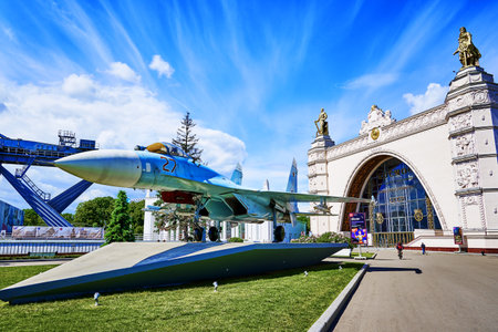17/06/2022 Russia Moscow VDNH Su-27 fighter jet on the background of the cosmos pavilion and the blue sky with clouds. high quality photoのeditorial素材
