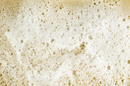 soap foam on beige foch texture background backdrop. high quality photoの写真素材