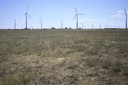wind farm in the steppe against the blue sky. high quality photoの写真素材