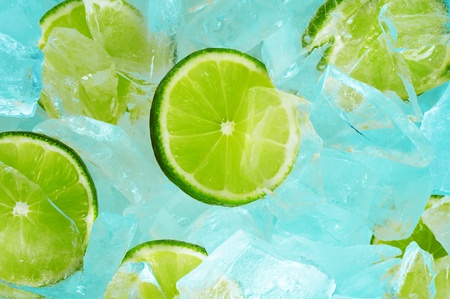 Lime slices in pieces of iceの写真素材