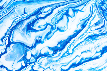 Fluid Art. Abstract colorful background, wallpaper. Mixing  paints. Modern art. Marble texture
