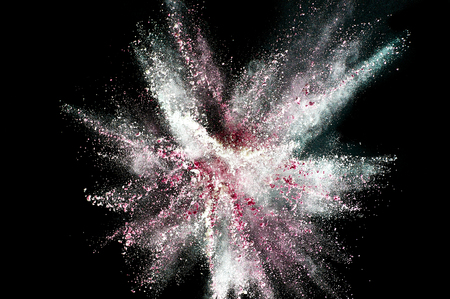 Colored powder explosion. Abstract closeup dust on backdrop. Colorful explode. Paint holiの写真素材