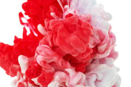 Ink in water. Splash paint mixing. Multicolored liquid dye. Abstract background colorの写真素材