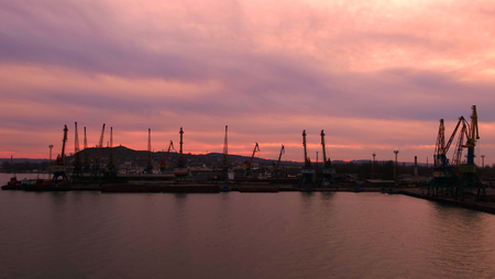 Coast port city of Novorossiysk sea industrial eveningの写真素材