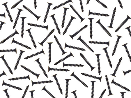 Screws on a white background repairs building spiral drill screwing material metal iron nail isolateの写真素材