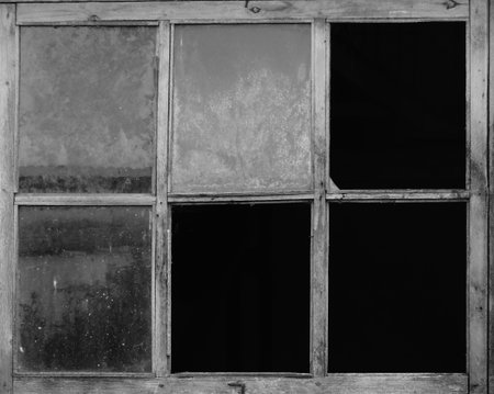 The old window in a building retro black white glass room darkness frame